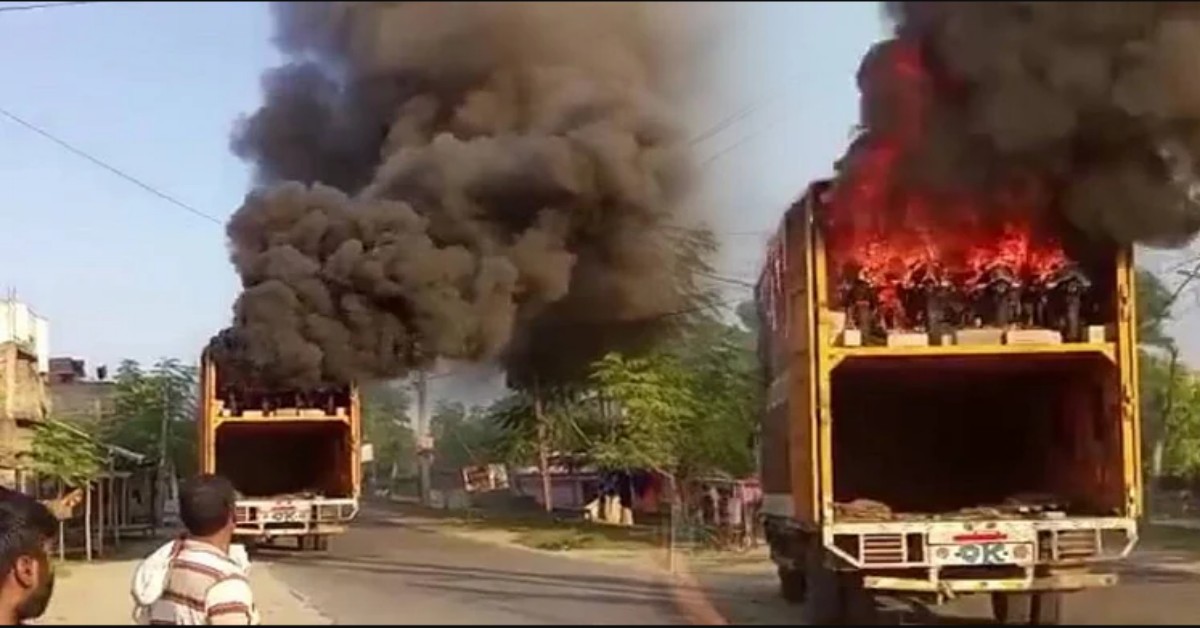 Motorcycle-laden truck catches fire
