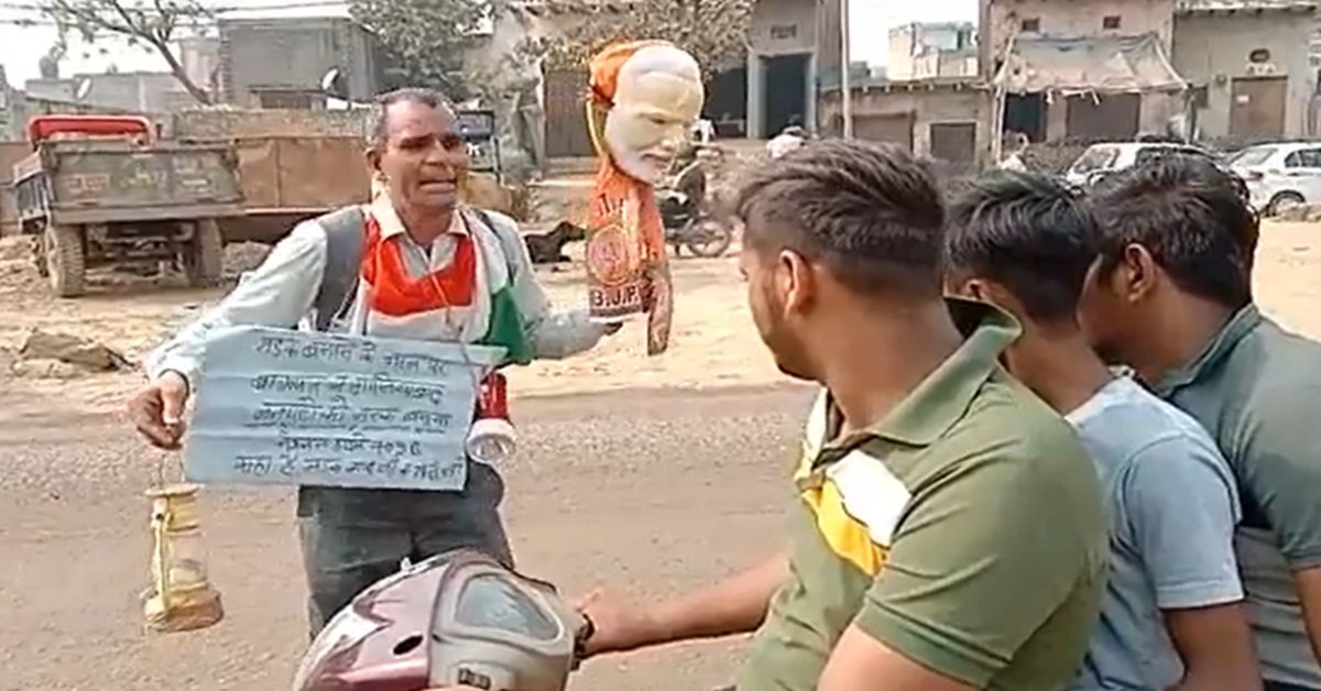 man performs skit with Modi Mask