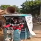 Man delivering alcohol on e-rickshaw