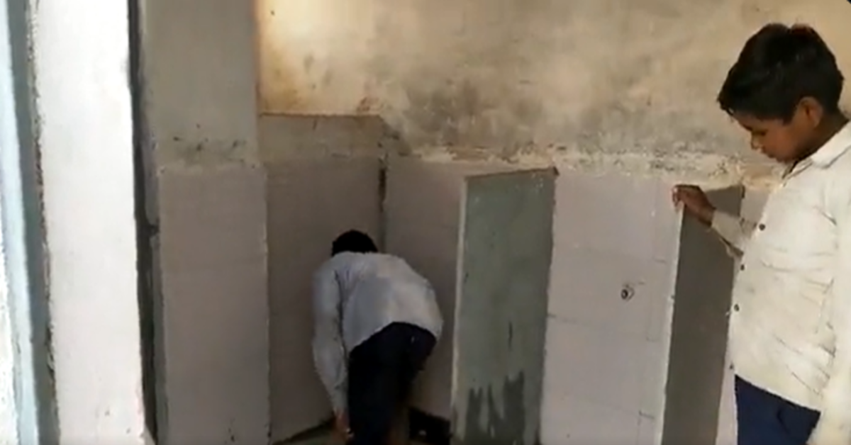 Dalit student cleans toilet