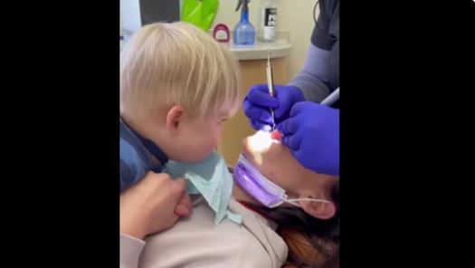 Toddler reaction on his mother's dental