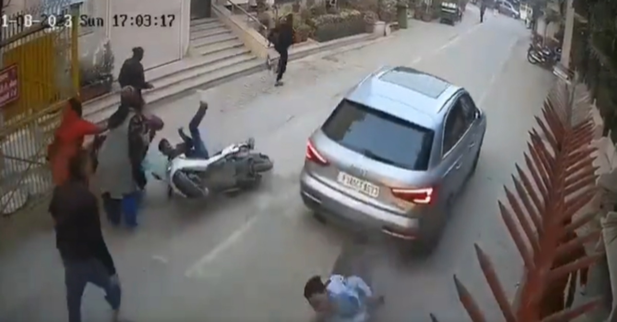 Security guard narrowly escapes death after being run over by Audi
