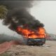 Farmers attack police, set police van on fire