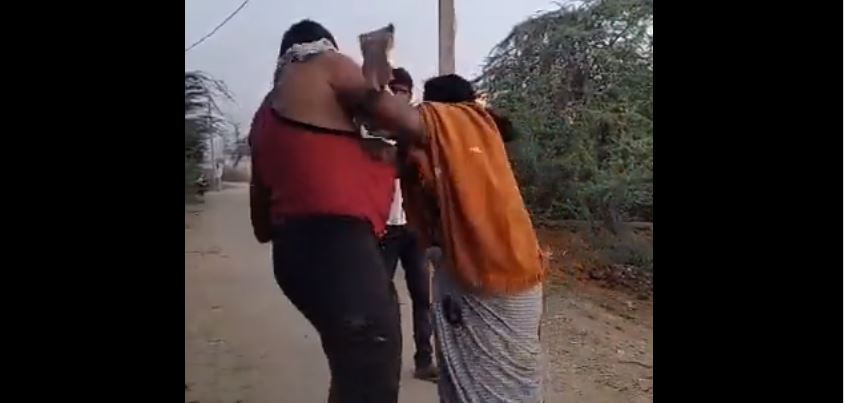 Man beats up woman