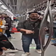 man singing in metro