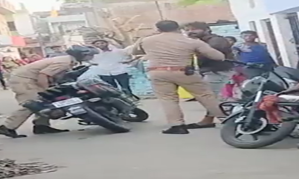 policemen beating up man in Uttar Pradesh