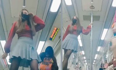 Woman Dancing in Delhi Metro