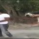 Police officer thrashes man