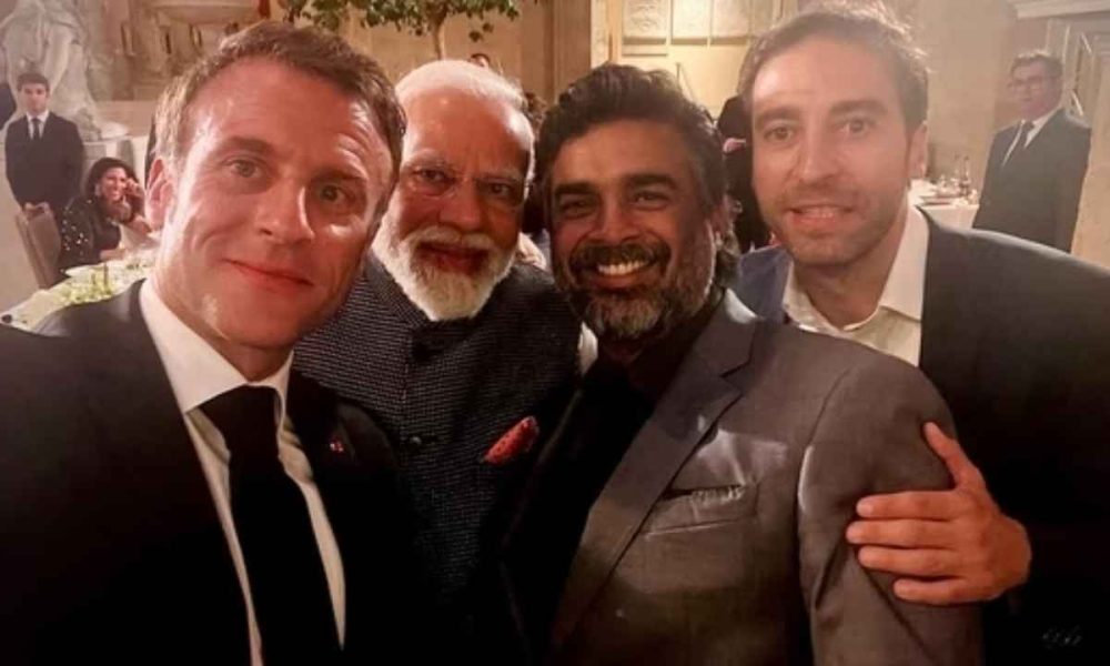 French President Emmanuel Macron clicks selfie with PM Narendra Modi, R Madhavan and Mathieu Flamini