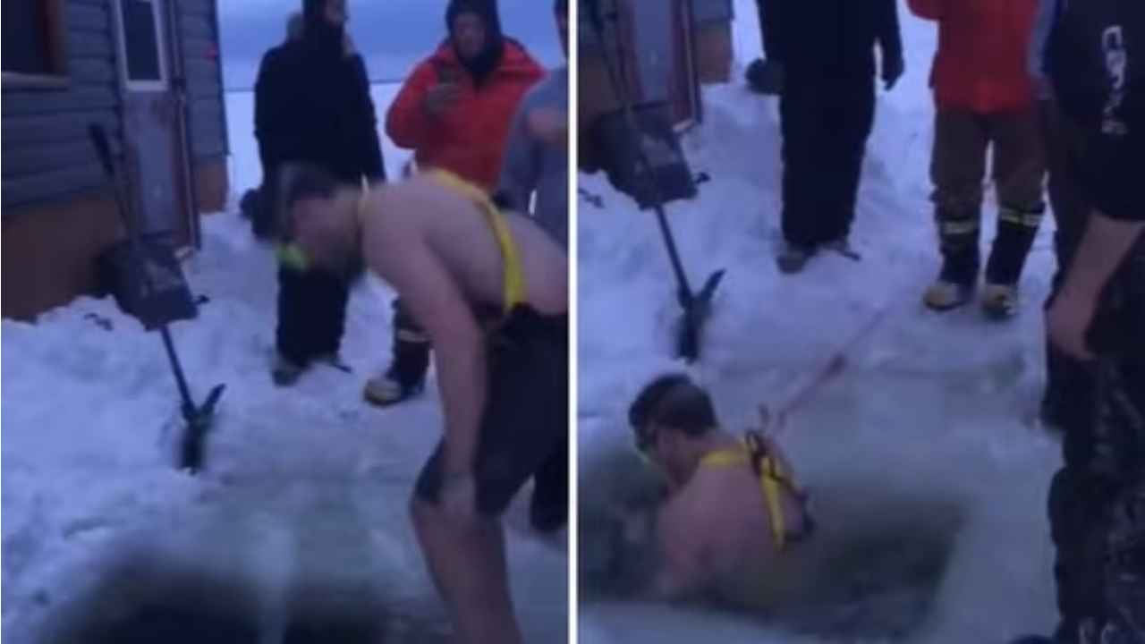 Watch: Man jumps into a frozen lake to retrieve friend’s lost phone