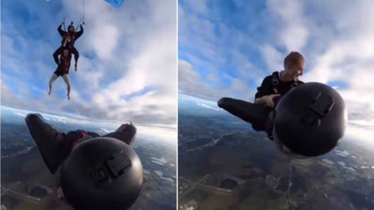 Watch: Woman does a hair raising stunt as she jumps off one sky diver onto another one