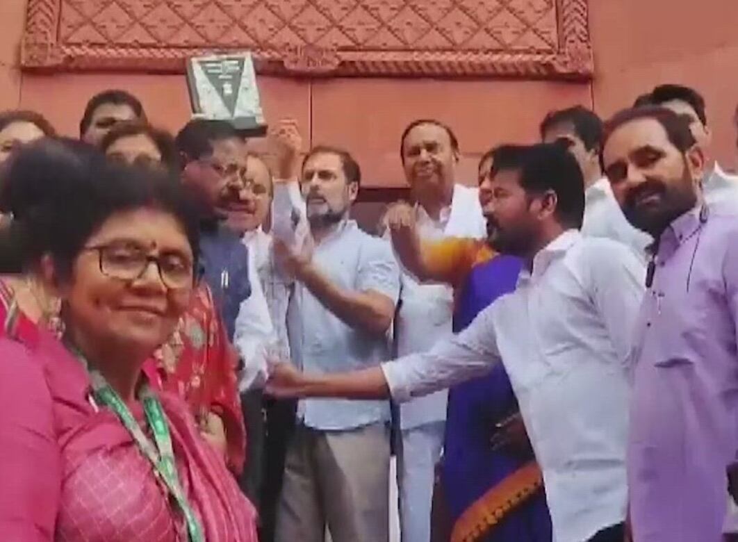 Adhir Ranjan Chowdhury holds Constitution of India in hand as Congress MPs enter new Parliament building | Watch