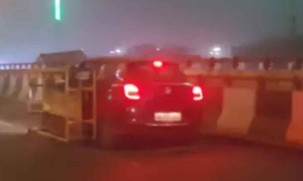 Watch: Swift drags Delhi police barricade on fly over, video goes viral
